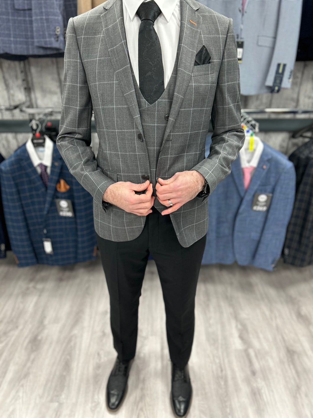 Jacob Grey Checked upper half with black trouser for hire