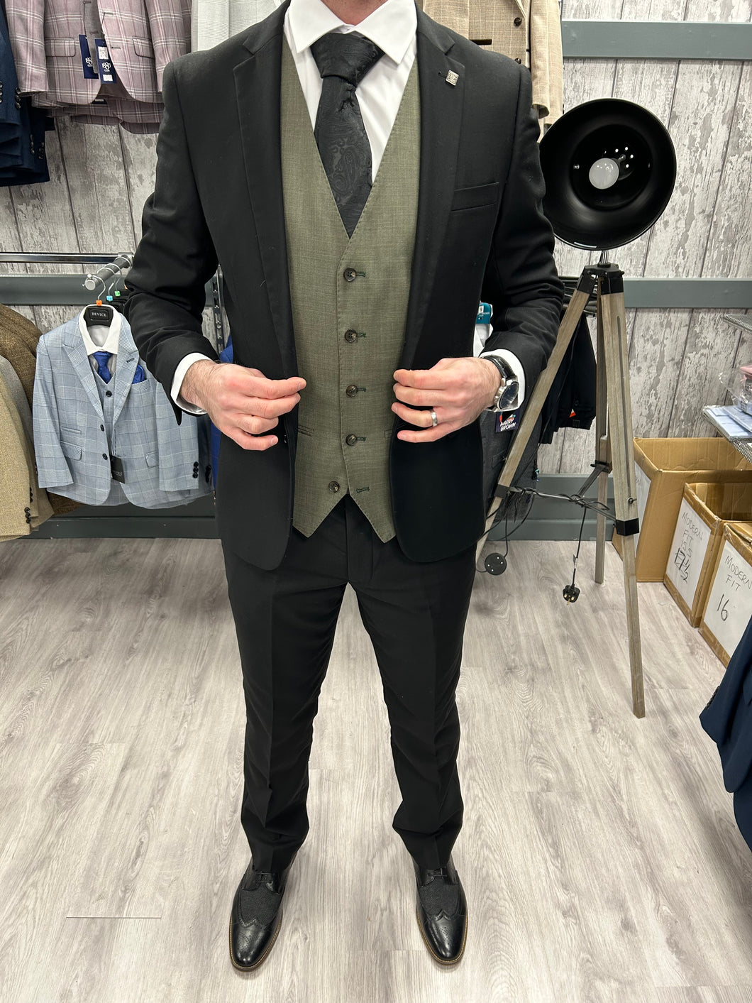 Parker black 2 piece with Kurt sage waistcoat suit for hire