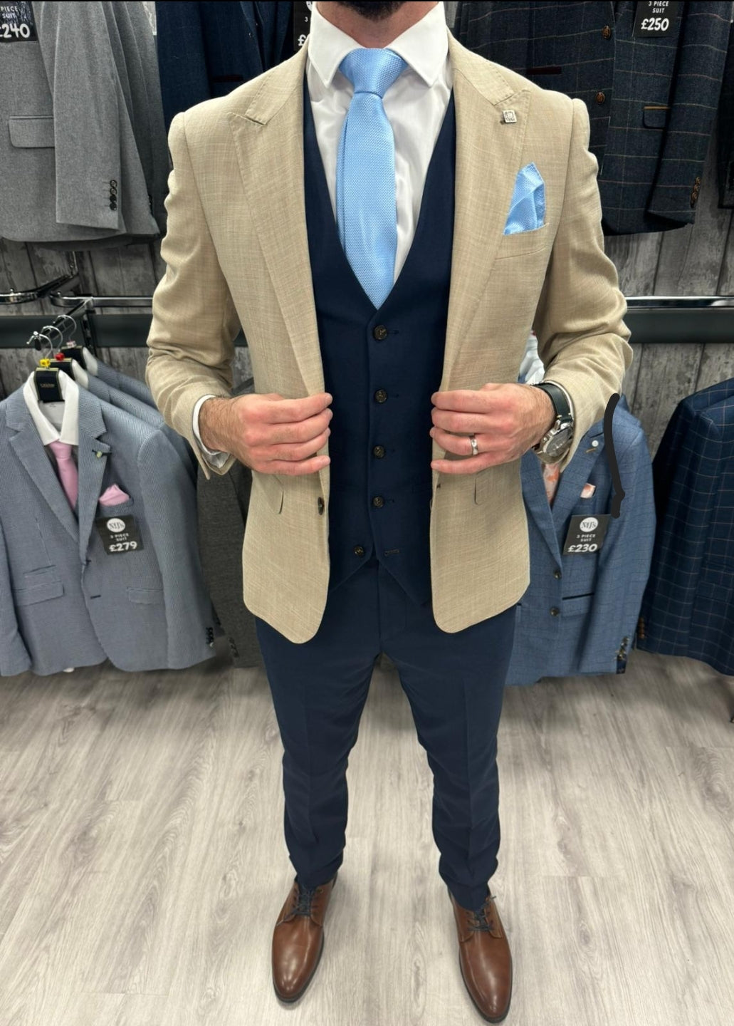 Beige jacket navy pants top